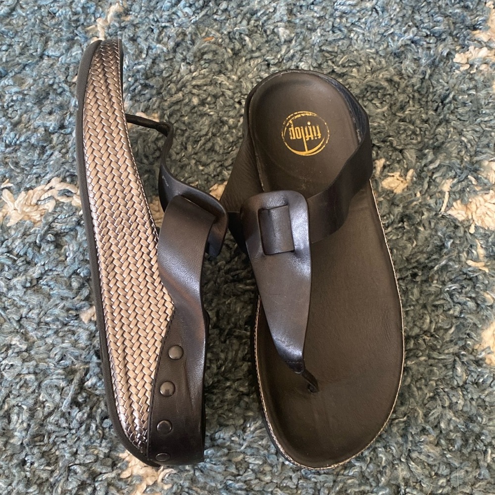 Fitflop sandals with silver sole.